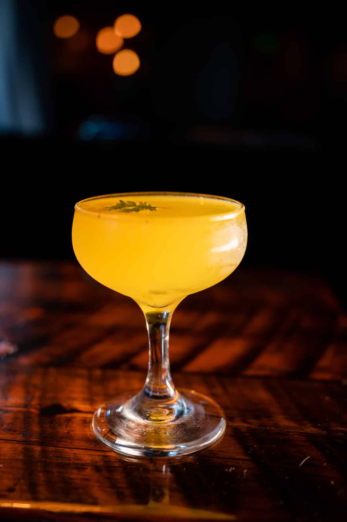 Hand-stirred cocktail being prepared with a barspoon